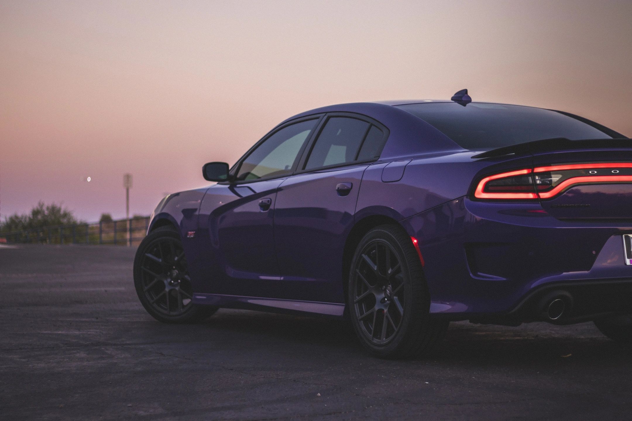 Sleek performance sedan at golden hour